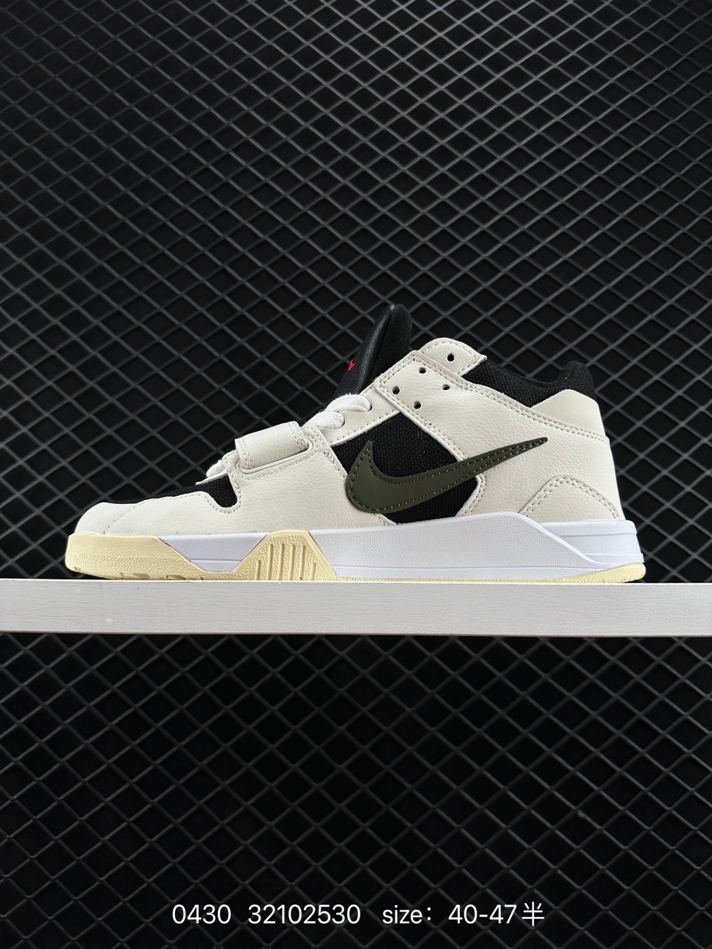 Travis Scott x Air Jordan Executive The Check